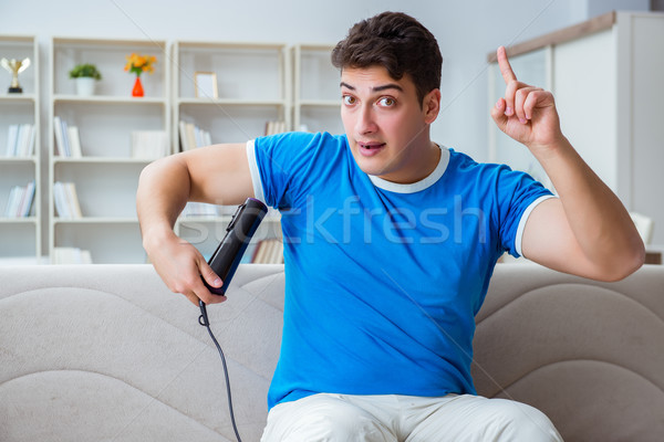 The man sweating excessively smelling bad at home Stock photo © Elnur