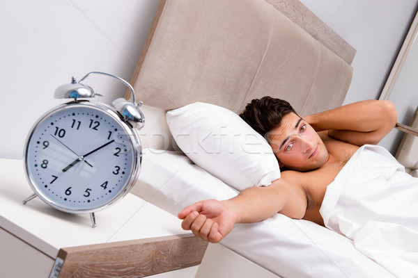 Man having trouble waking up in morning Stock photo © Elnur