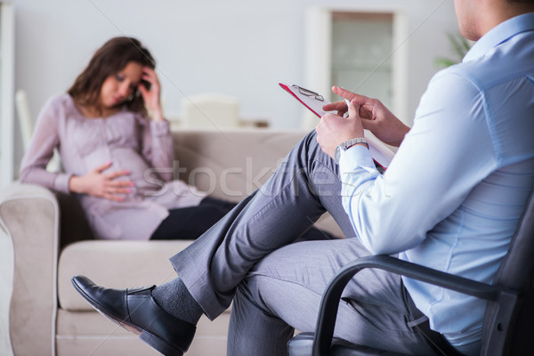 Stock photo: Pregnant woman visiting psychologist doctor