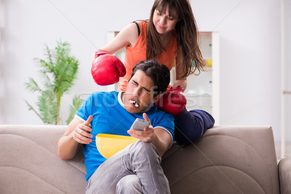 Wife unhappy that husband is watching boxing Stock photo © Elnur