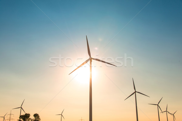 Wind mills during bright summer day Stock photo © Elnur