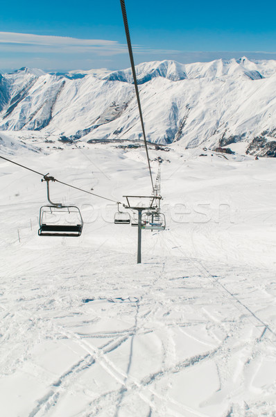 Skilift on ski resort during winter on bright day Stock photo © Elnur
