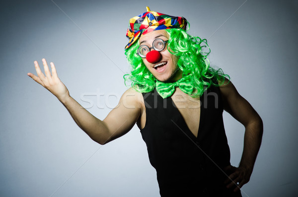 Funny clown against the dark background Stock photo © Elnur