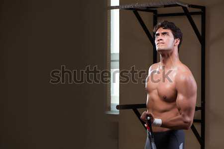 Muscular actor with theatrical mask Stock photo © Elnur