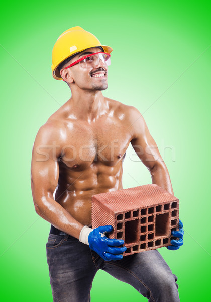 Musculaire constructeur briques blanche construction travaux Photo stock © Elnur
