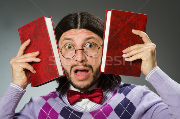Young student with book in learning concept Stock photo © Elnur