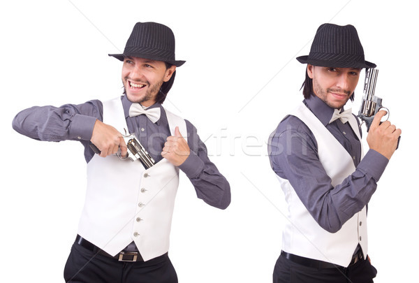Stock photo: The man with gun isolated on the white