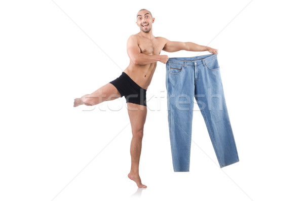 Mann Diäten Jeans glücklich Gesundheit Stock foto © Elnur