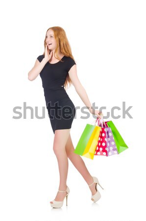 Woman after shopping spree on white Stock photo © Elnur