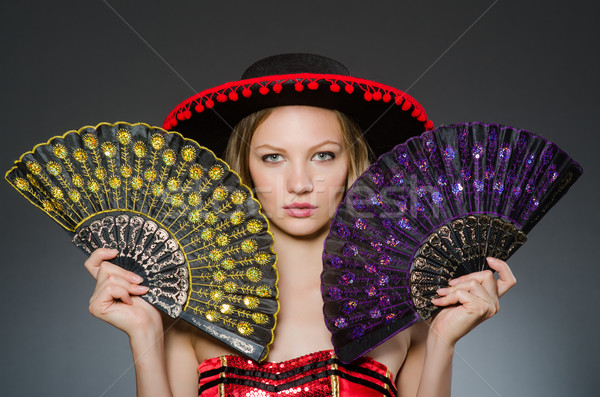 Woman dancing with fans in arts concept Stock photo © Elnur