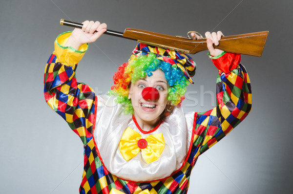 Zdjęcia stock: Clown · karabin · odizolowany · biały · działalności · strony
