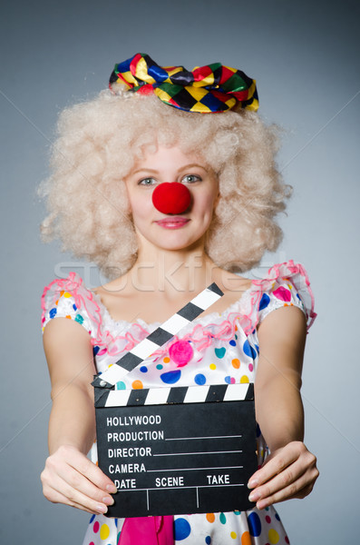 Clown with movie clapper board Stock photo © Elnur