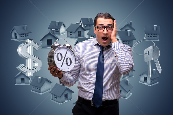 Young businessman surprised at high interest mortgage rates Stock photo © Elnur