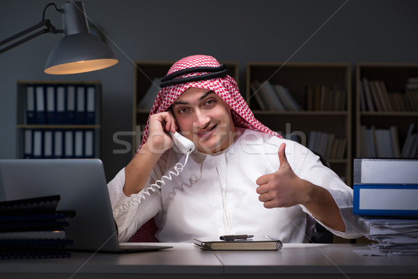 Stock photo: Arab businessman working late in office