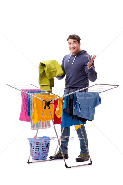 Husband man doing laundry isolated on white Stock photo © Elnur