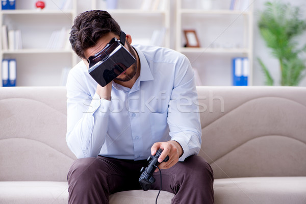 Student gamer playing games at home Stock photo © Elnur