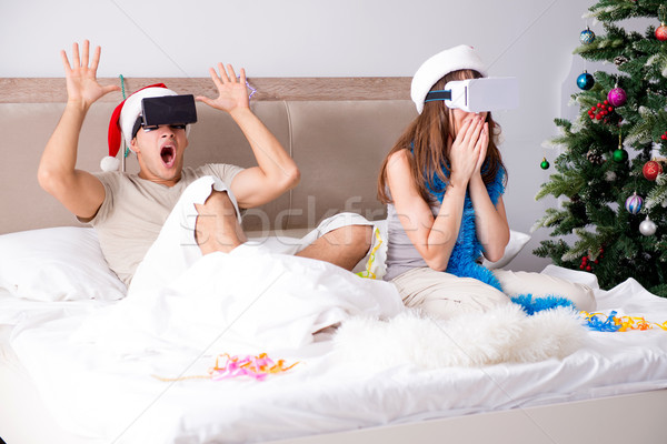 Happy couple celebrating christmas holiday in bed Stock photo © Elnur