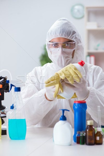 Chemist checking the quality of bathroom supplies Stock photo © Elnur