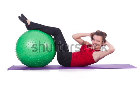 Woman exercising with swiss ball on white Stock photo © Elnur