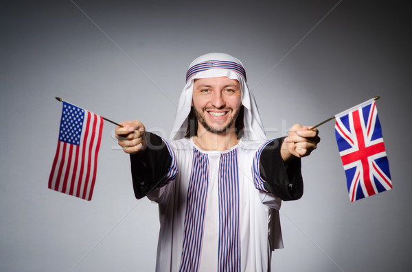 Arab férfi Egyesült Királyság zászló üzlet háttér Stock fotó © Elnur