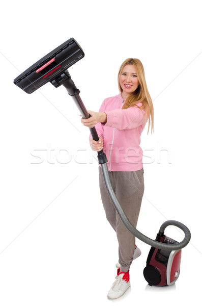 Young woman with vacuum cleaner on white Stock photo © Elnur
