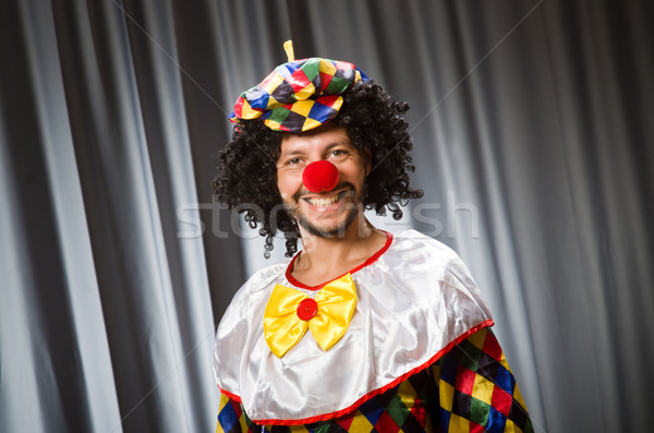 Funny clown in humorous concept against curtain Stock photo © Elnur