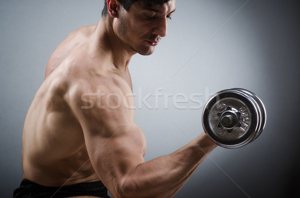 Izmos testépítő súlyzók sport fitnessz egészség Stock fotó © Elnur