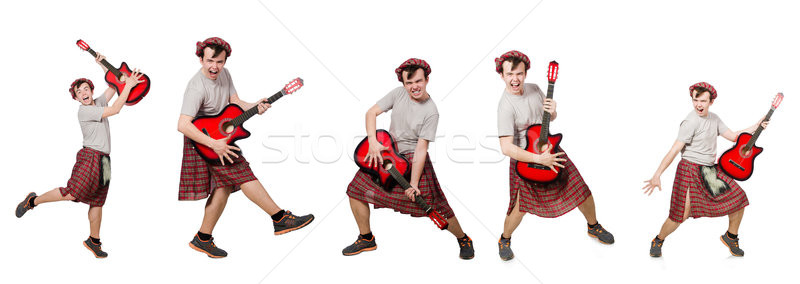 Stock photo: Scotsman playing guitar isolated on white
