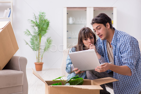 Young family moving in to new apartment after paying off mortgage Stock photo © Elnur