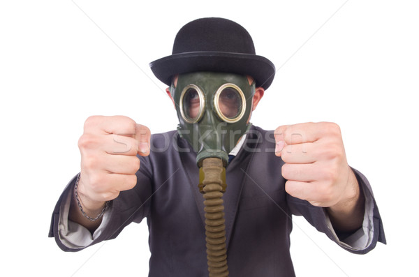 Businessman wearing gas mask isolated on white Stock photo © Elnur
