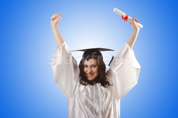 Diplômé diplôme blanche sourire étudiant succès Photo stock © Elnur