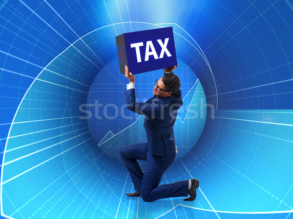 Man under the burden of tax payments Stock photo © Elnur
