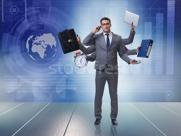 Giovani imprenditore multitasking business computer uomo Foto d'archivio © Elnur