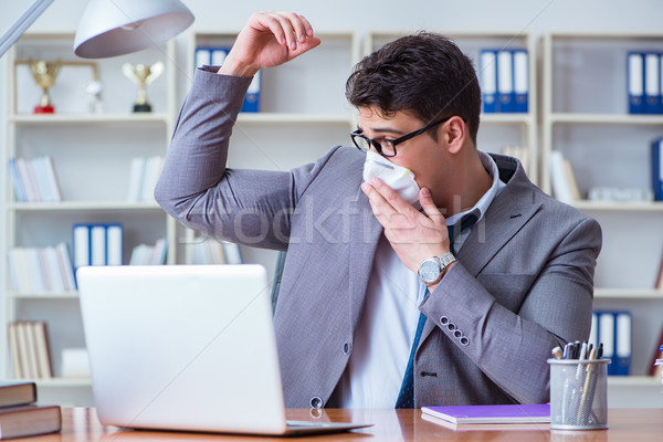 Businessman sweating excessively smelling bad in office at workp Stock photo © Elnur