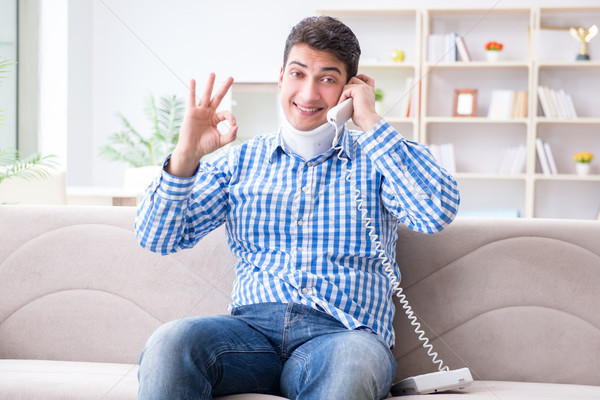 Man with a head neck spine trauma wearing a neck brace cervical  Stock photo © Elnur