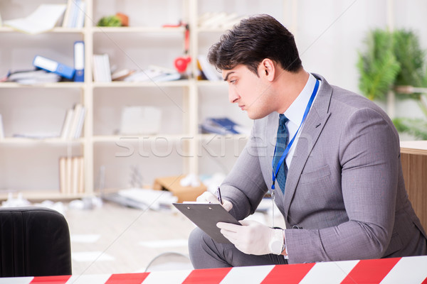 Young man during crime investigation in office Stock photo © Elnur