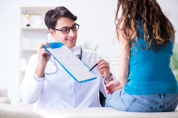 Woman visiting doctor in medical concept Stock photo © Elnur