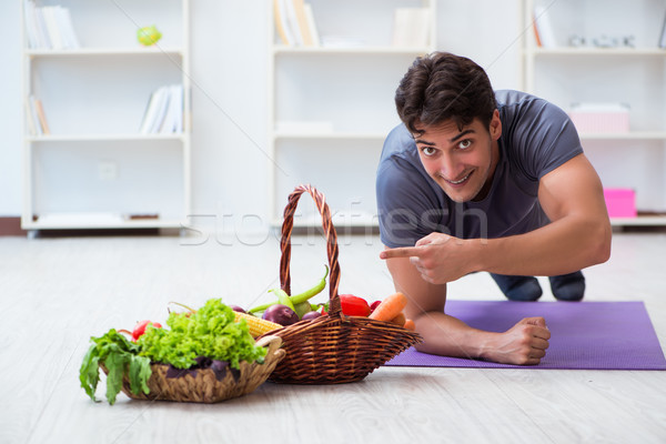 Man promoting the benefits of healthy eating and doing sports Stock photo © Elnur