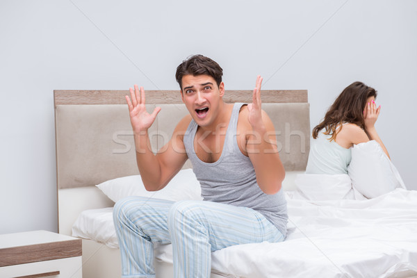 Family conflict with wife and husband in bed Stock photo © Elnur