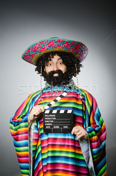 Funny hairy mexican with movie clapper Stock photo © Elnur
