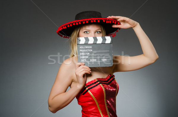 Funny mexican woman with sombrero and movie clapboard Stock photo © Elnur