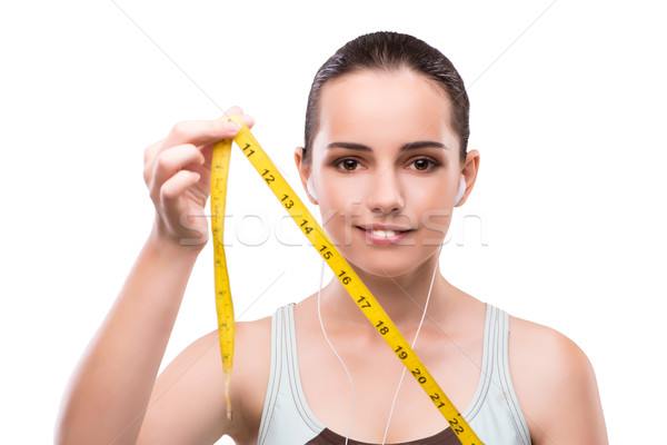 Young woman with centimeter in diet concept Stock photo © Elnur
