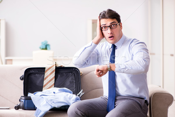 Stock photo: The businessman preparing for the business trip
