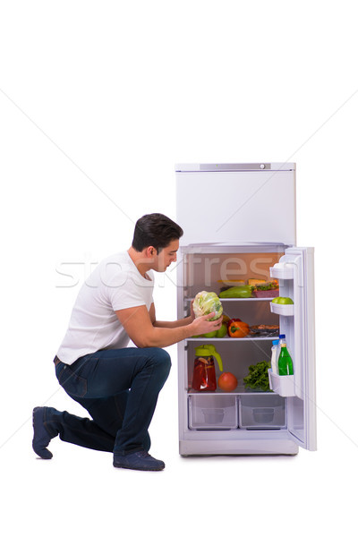 Férfi hűtőszekrény tele étel ház boldog Stock fotó © Elnur