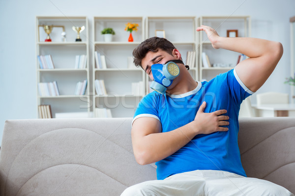 The man sweating excessively smelling bad at home Stock photo © Elnur