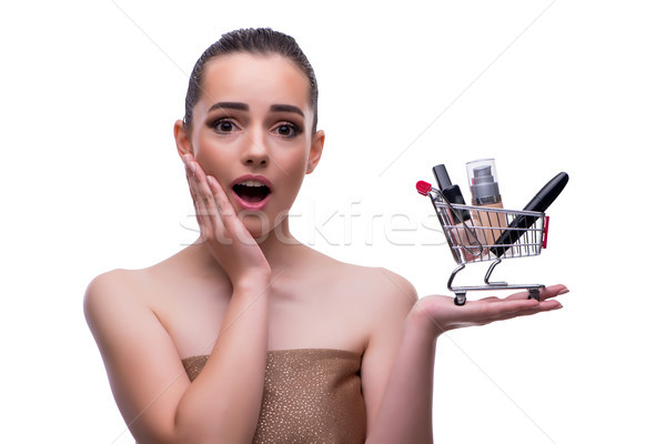 Woman in beauty concept with make up holding shopping cart Stock photo © Elnur
