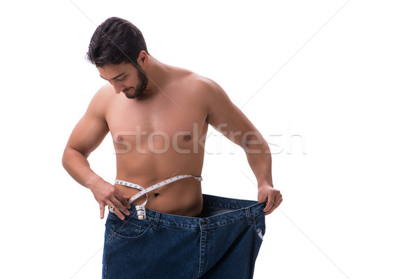 Mann Diäten Jeans glücklich Gesundheit Stock foto © Elnur