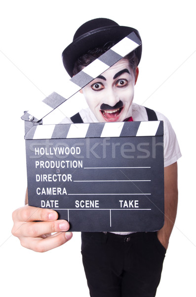 Man with movie clapper isolated on white Stock photo © Elnur