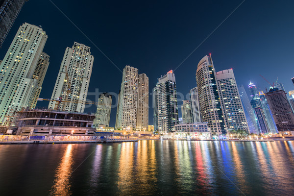 Foto stock: Dubai · marina · arranha-céus · noite · céu · água