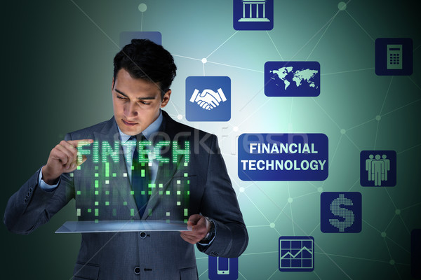 Businessman with tablet in financial technology fintech concept Stock photo © Elnur